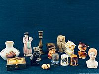 Full group shot of all sixteen items displayed on dark blue background