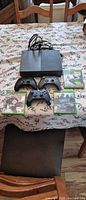 Console, controllers, game cases overview