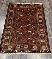 Full view of Turkman wool rug on wood floor