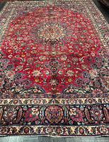 Full view of rug showing entire field and borders