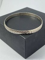 Full view of silver etched bangle