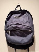 Front view of Columbia backpack showing logo, pockets, straps