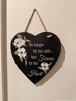 Front view of slate heart plaque showing text and floral design