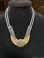 Front view showing full necklace layout on bust