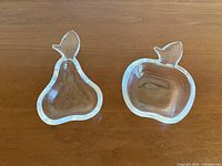 Pear and apple crystal dishes top view