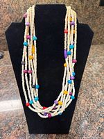 Front view showing full necklace drape and bead pattern