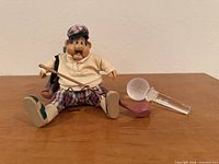 Overall view of figurine and crystal stopper