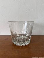 Front view showing faceted sides and leaf band