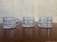 Side view of all three Waterford crystal pieces