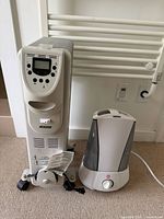 Garrison heater and Life Brand humidifier side by side