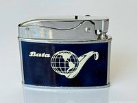 Front view of chrome and navy enamel lighter with Bata globe logo
