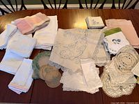 Overview of assorted linens spread on table