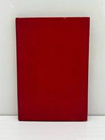Front red cloth cover of the hardcover book