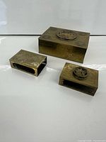 Brass trinket box with jade lid insert and two brass matchbox covers