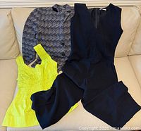 Overview of all three garments laid out on sofa