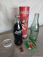 Overview of all Coca-Cola items on table