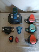 Group shot of all eight paper punches arranged on fabric surface