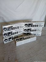 Seven Bob Ross Oil Color boxed paint tubes grouped on surface