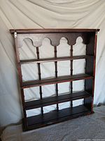 Full view of wooden display cabinet front