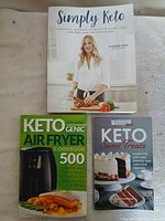 Front covers of all three keto cookbooks