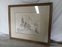 Full view of framed signed pencil drawing