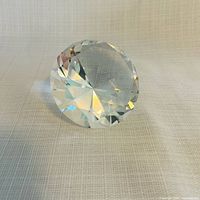 Front view of faceted crystal diamond paperweight