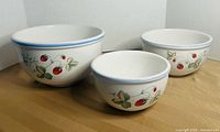 Three Savoir Vivre fruit-pattern mixing bowls