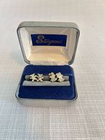 Four novelty-shaped sterling silver stud earrings in Stargems box