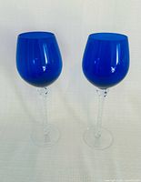Front view of both cobalt blue goblets standing upright