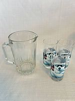 Pitcher and three Polar Bear tumblers side by side