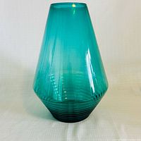 Full view of teal glass vase