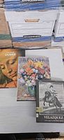 All three art books laid out: The Hidden Dürer, Renoir, Velazquez