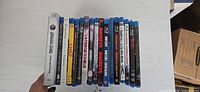 Row of Blu-ray spines showing titles and case condition