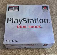 Front of PlayStation Dual Shock retail box