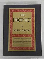 Slipcase front with decorative label displaying title and author