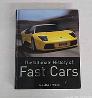 Front cover showing full title, author and cover car image