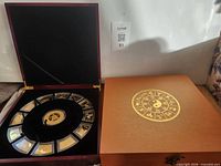 Open presentation box showing full coin set arrangement