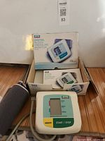 Monitor, cuff, and box together