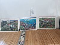 Three USPS Nature of America stamp panes standing upright