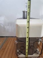 Front view showing full juicer height measured