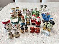 Group shot of all 32 shakers in lot