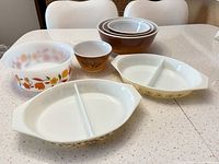 All seven pieces displayed together on countertop