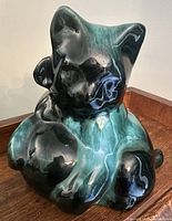 Front view of Blue Mountain Pottery cat figurine showing glaze and form