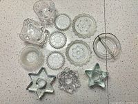 Full overhead view of all 13 glass pieces