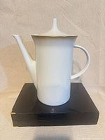Left side view of Rosenthal porcelain coffee/tea pot with lid showing handle and spout