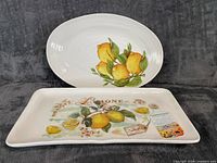 Front view of both platters showing lemon motif and overall condition