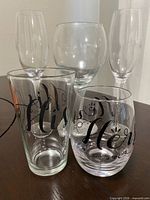 Front view of all five glasses showing designs and shapes