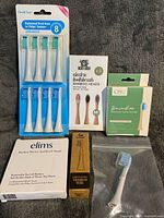 All boxed and loose replacement toothbrush heads displayed