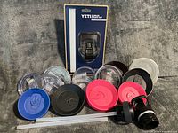All YETI Rambler lids, caps, straws and packaged Straw Cap displayed together