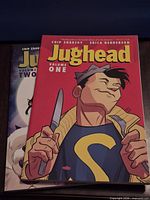 Front covers of Jughead Volume 1 on top of Volume 2